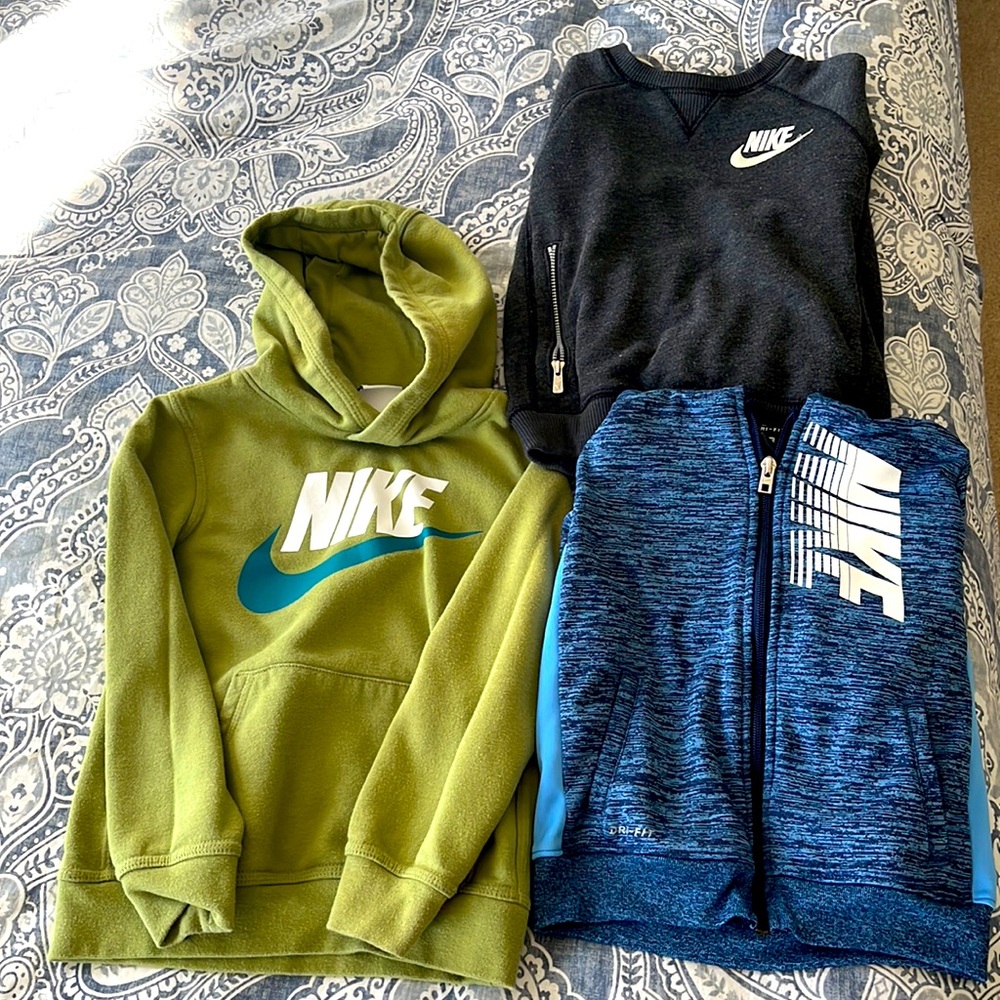 Size 4T Nike Hoodie , Sweatshirt and zip up jacket selling as a set .